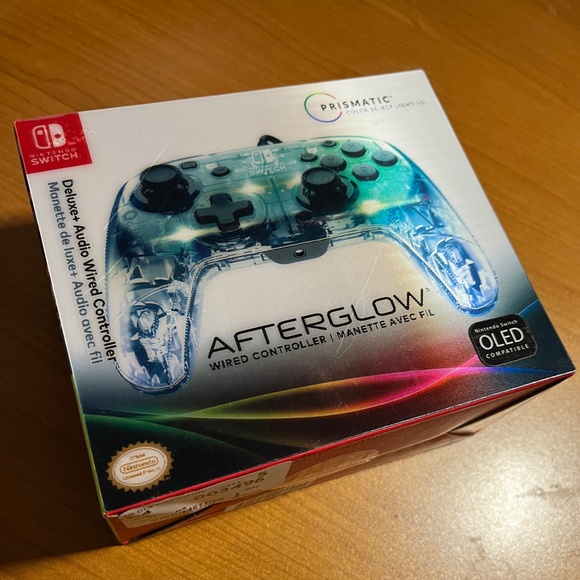 New Nintendo Switch Afterglow Deluxe Audio Game LED Lighting Controller - Picture 1 of 3